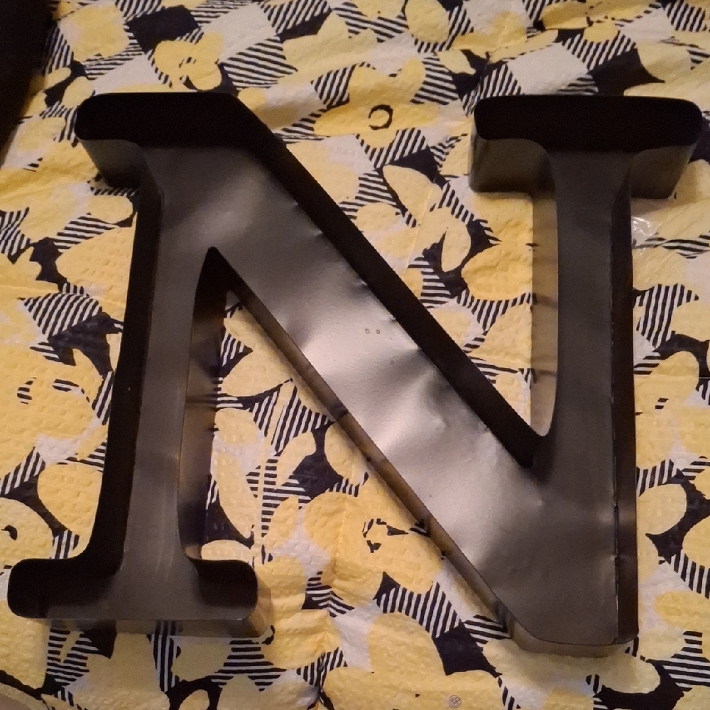 Black Metal Letter N that You Fill With Wine Corks